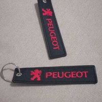 Текстилен ключодържател с бродиран червен надпис и емблема на Пежо Peugeot кола автомобил джип ван б, снимка 3 - Аксесоари и консумативи - 34592522
