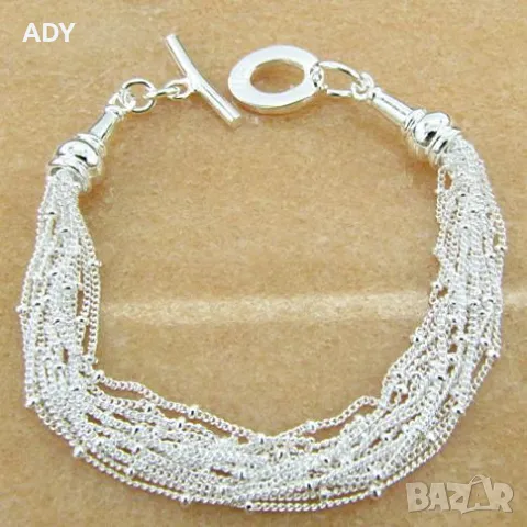 ЕЛЕГАНТНА  ПОСРЕБРЕНА ГРИВНА  - 925