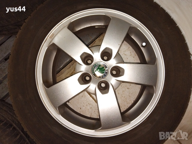 Алуминиеви джанти и гуми 15 оригинални Шкода Октавия, снимка 4 - Гуми и джанти - 53215012