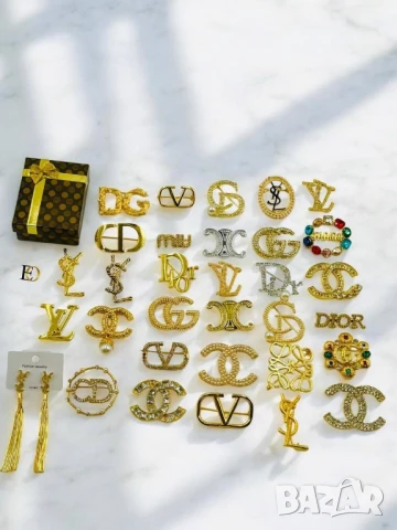 брошки dolce gabbana chanel ysl saint laurent dior jadore Louis vuitton  saint laurent 
