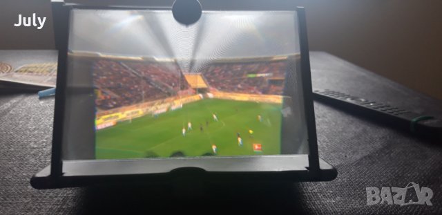 Преносим усилвател за уголемяване на екран. 