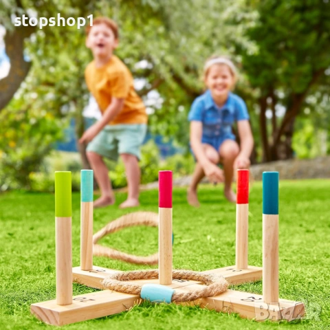 хвърляне на рингове TP Toys - Включва 5 цветни дървени колчета и перваз и 5 цветни въжени ринга. Изр