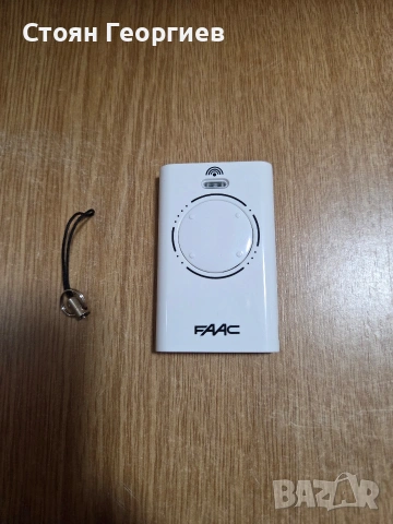 Дистанционно управление за гаражни врати и автоматизация FAAC XT4 868 SLH LR. Честота: 868.35 MHz.