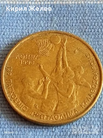 Монета 100 драхми 1998г. Гърция XIII световно първенство по Баскетбол Атина 34763, снимка 4 - Нумизматика и бонистика - 49986283
