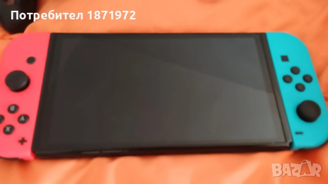 Продавам Nintendo Switch OLED ,пълен комплект + 2 оригинални игри, снимка 3 - Nintendo конзоли - 52863054