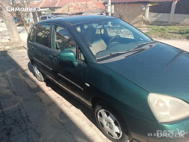 Suzuki Liana, снимка 3 - Автомобили и джипове - 49439620