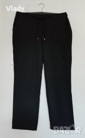Нов дамски черен панталон 42 размер  