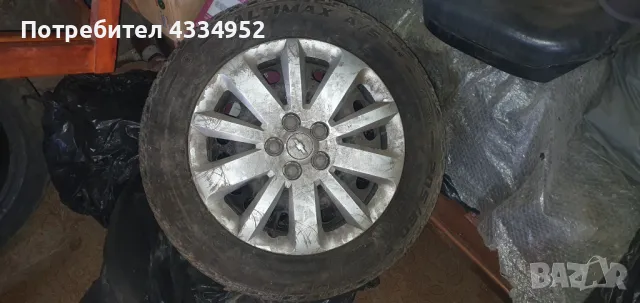 Железни джанти за Шевролет Круз 16" със зимни гуми и оригинални тазове, снимка 3 - Гуми и джанти - 48427866