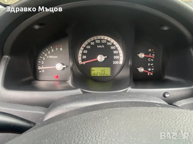 Kia Sportige 2.0i 140 4x4, снимка 13 - Автомобили и джипове - 47326001