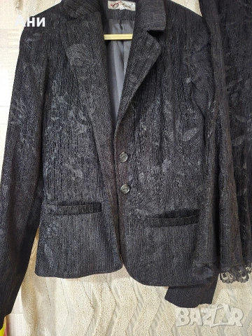 Елегантен дамски костюм