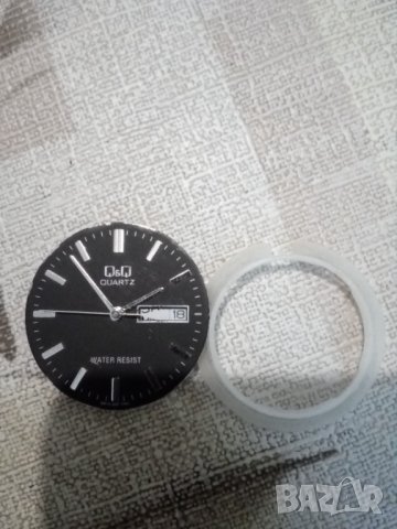 Q&Q часовник