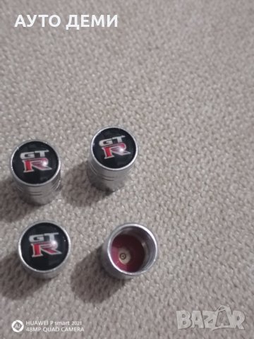 Качественни не ръждаем метал хром капачки за вентили винтили с емблеми на Нисан Nissan GTR кола джип, снимка 2 - Аксесоари и консумативи - 34592427