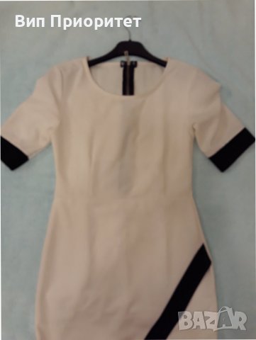 Бяла рокля , интересен модел,гарнирана с черни сегменти и черен дълъг цип на гърба,еластична материя, снимка 9 - Рокли - 37434606