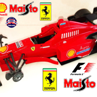 Ferrari F310 М. Schumacher 1996 Maisto Thailand 1:20, снимка 1 - Колекции - 42415809