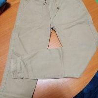 Нови бежови панталони с ластик размер 150, снимка 1 - Детски панталони и дънки - 22651319