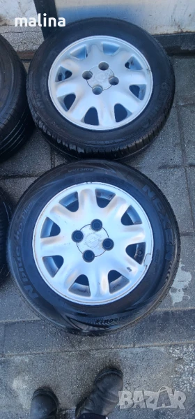 Джанти с гуми 14-ки 4х100 за Опел , снимка 1