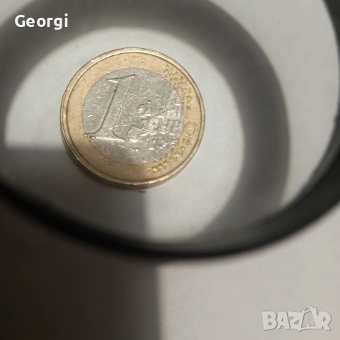 1 евро монета 2002 г. с рядка фабрична грешка при сеченето допълнителен метал под единицата