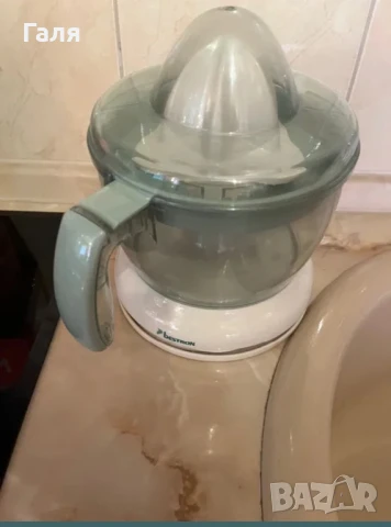 Електрическа цитрус преса, снимка 4 - Сокоизстисквачки и цитрус преси - 50667966