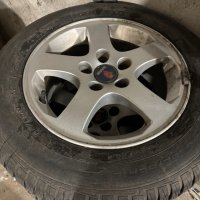 Оригинални джанти за СААБ със зимни гуми, снимка 1 - Гуми и джанти - 43306234