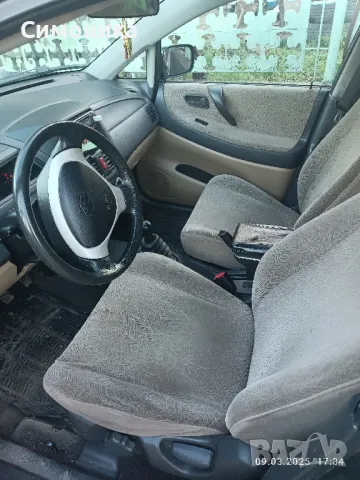 Suzuki Liana, снимка 7 - Автомобили и джипове - 49439620