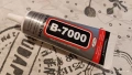 Лепило В7000, 50 мл.. Приложение при ремонт на мобилни телефони, таблети., снимка 1