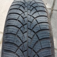 Продавам 4 бр. зимни гуми Goodyear 165/70/14 на метални джанти, снимка 1 - Гуми и джанти - 43855035