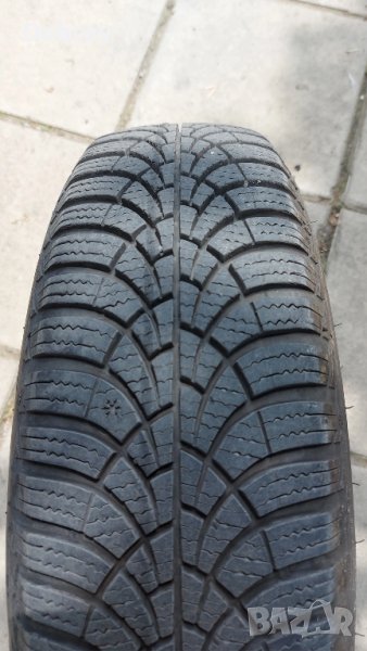 Продавам 4 бр. зимни гуми Goodyear 165/70/14 на метални джанти, снимка 1