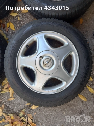 4 броя гуми с гуми , снимка 4 - Гуми и джанти - 52110642