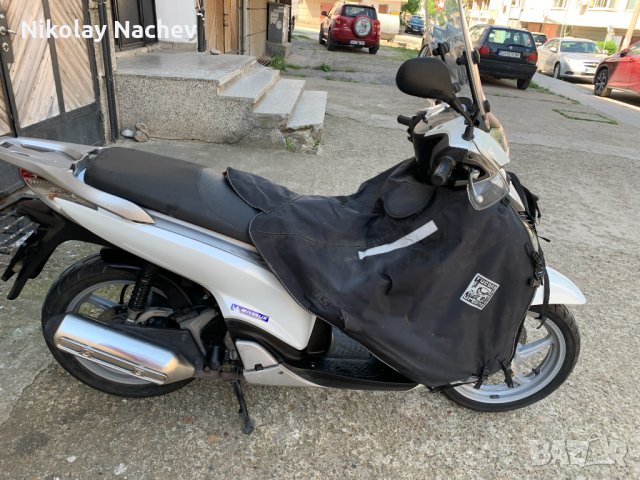 Предпазен калъф за крака и тяло за мотоциклет.