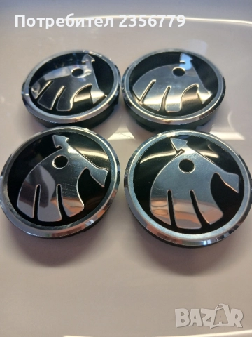 Капачки за джанти Шкода черни 52/55, снимка 3 - Аксесоари и консумативи - 52430493