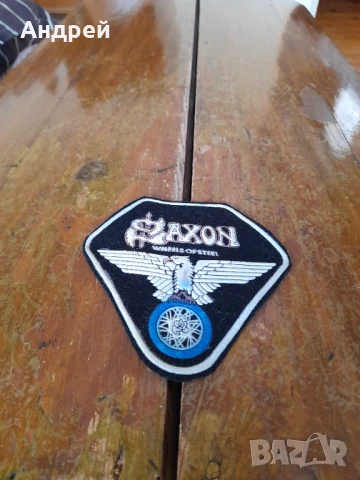 Стара емблема Saxon Wheels of Steel