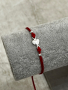 Гривна червен конец със сребърна фигура сърце, снимка 1 - Гривни - 44879160