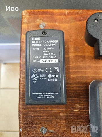 Зарядно за фотоапарат Olympus CASIO  Зарядно за батерия на фотоа, има зарядно и калъф за съхранение., снимка 8 - Батерии, зарядни - 52128509
