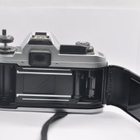 Фотоапарат Nikon FG-20 с обектив Nikkor 50mm f/1.8, снимка 11 - Фотоапарати - 43104294