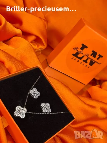Комплект сребристи обеци и колие 