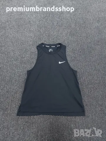 Nike дамски потник XS , снимка 1 - Потници - 47707697