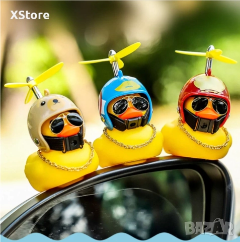 Малко жълто пате декорация за интериора на автомобил с каска и колело. Два варианта, снимка 2 - Аксесоари и консумативи - 52444253