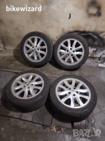 Джанти с летни гуми Firestone 215 50 17 цола 5 х114.3 66.1 централен