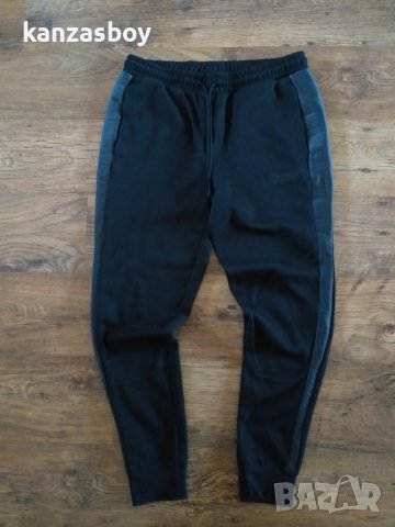  PUMA T7 PUMA x BATMAN Track Pants - страхотно мъжко долнище НОВО ХЛ, снимка 10 - Спортни дрехи, екипи - 43078229