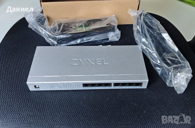 8 портов гигабитов PoE+ суич Zyxel GS1008HP, снимка 4 - Суичове - 50979485