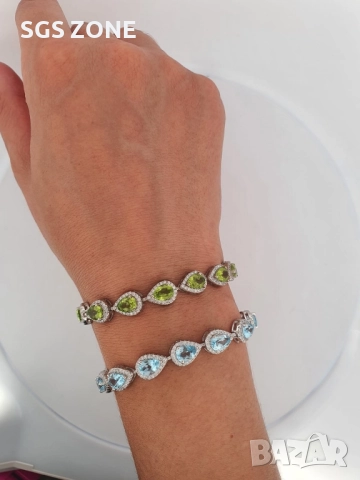 СРЕБЪРНА ГРИВНА СЪС СИН ТОПАЗ И ПЕРИДОТ 925