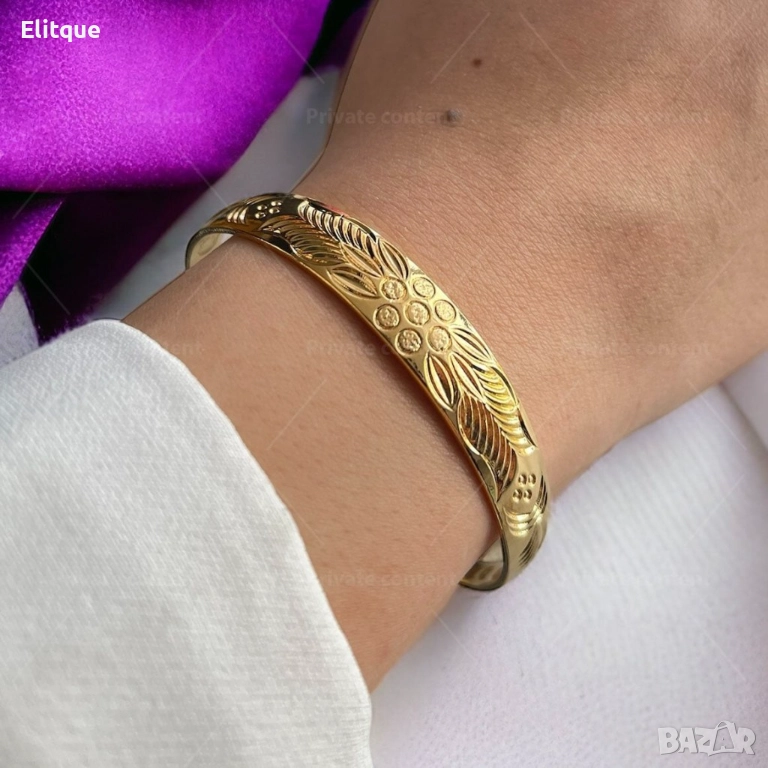 Лъскави линии позлатена дамска гривна R e b e c c a от медицинска стомана за блясък и стил, снимка 1