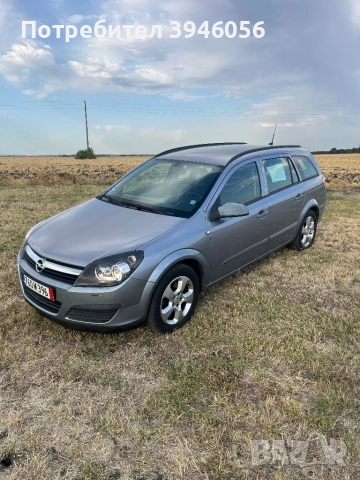 Опел Астра 1,9 6ск Навигация , снимка 5 - Автомобили и джипове - 52887975