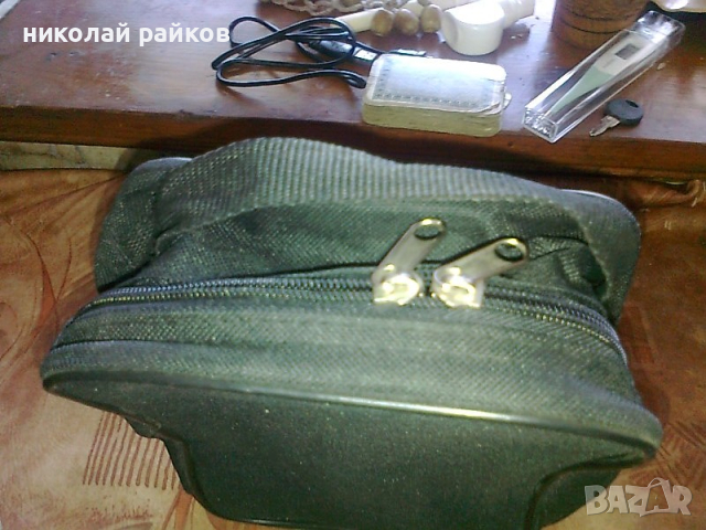 Чантичка за документи или тоалетни тринаслежности