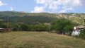 Южен поземлен имот с панорама, река и гора в Карлово., снимка 1 - Парцели - 43172072