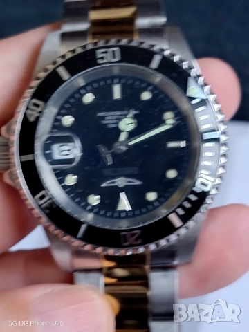 INVICTA .часовник.