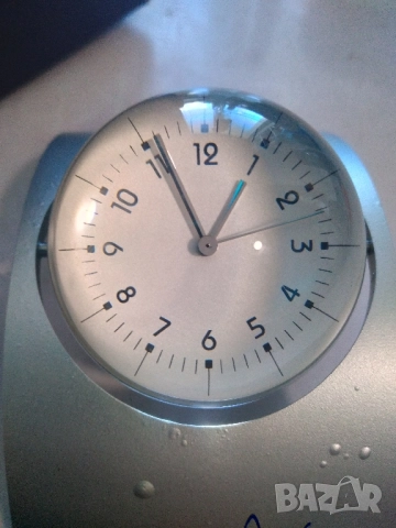 Рекламен часовник с интересен дизайн