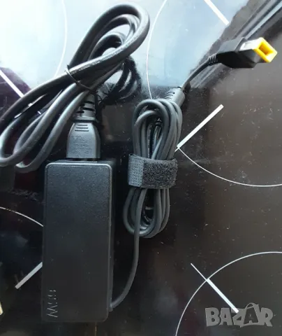 Продавам зарядно за лаптоп Lenovo 65W с жълтата букса