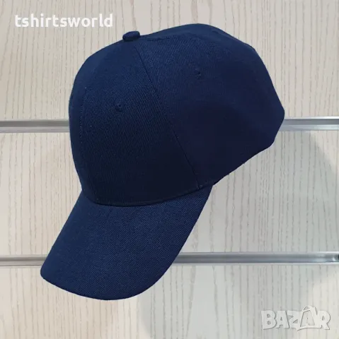 Нова изчистена шапка с козирка в тъмносин цвят, снимка 3 - Шапки - 47494608