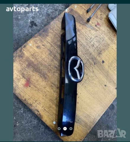 Mazda CX-7 2010година Лайсна багажник с емблема, снимка 2 - Части - 40373687